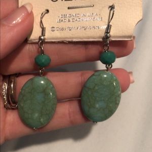 Green dangle earrings